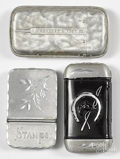Three aluminum match vesta safes, to include one advertising for Kearney & Foot Co., with a file