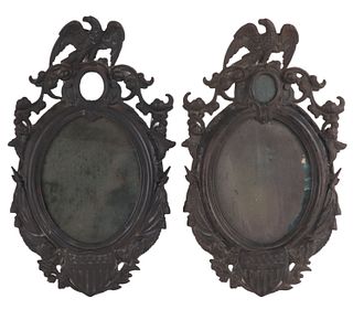 Two Cast-Iron Eagle Decorated Mirrors
