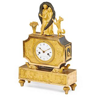 EMPIRE GILT AND PATINATED BRONZE MANTLE CLOCK