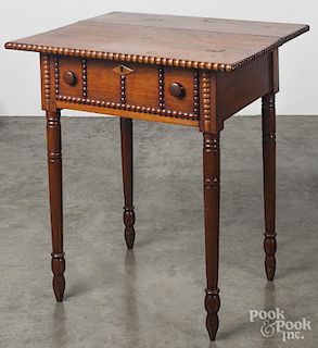 Sheraton walnut one-drawer stand, early 19th c., with applied beaded molding, 29 1/2'' h., 26'' w.