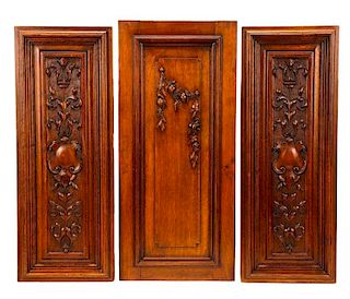 Group of Three Carved Mahogany Wall Plaques