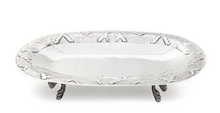 * A Mexican Silver Bread Tray, Casa Prieto, Mexico City, Mid 20th Century, oval with lightly spot-hammered surface, the wide bor