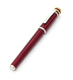 A Trinity Bordeaux Lacquer and Platinum Ballpoint Pen, Cartier, Early 21st Century, body and cover in red lacquer, the twist-off