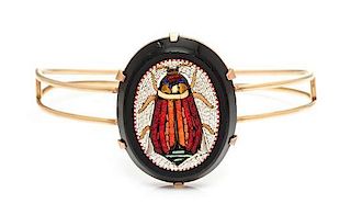 An Egyptian Revival Rose Gold and Scarab Micromosaic Bangle, 16.60 dwts.