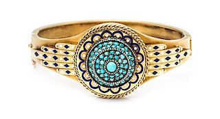 An Egyptian Revival Gold, Silver, Turquoise and Polychrome Enamel Bangle Bracelet, 29.60 dwts.
