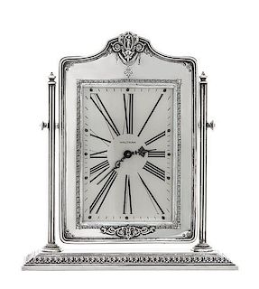 An American Silver Clock, Reed & Barton, Taunton, MA, the rectangular frame with arched top chased with a female medallion and d