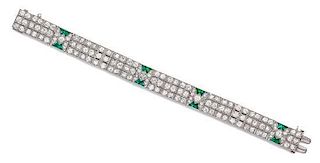 An Art Deco Platinum, Diamond, and Simulated Emerald Bracelet, 19.10 dwts.