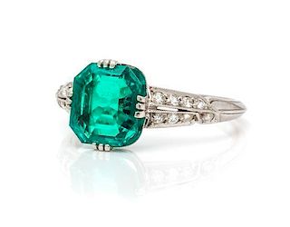 An Art Deco Platinum, Colombian Emerald and Diamond Ring, Tiffany & Co., 1.80 dwts.