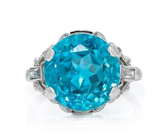 An Art Deco Platinum, Blue Zircon, White Sapphire and Diamond Ring, 4.40 dwts.