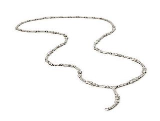 * A Platinum and Diamond Longchain Lavaliere Necklace, Circa 1920, 21.20 dwts.