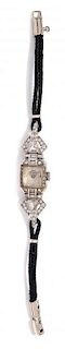 A Platinum and Diamond Wristwatch, Girard-Perregaux,