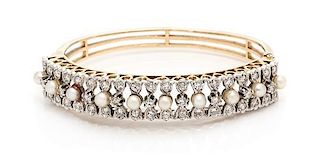 A Bicolor Gold, Cultured Pearl and Diamond Bangle Bracelet, 20.80 dwts.