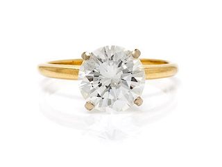 A Yellow Gold and Diamond Solitaire Ring, 1.50 dwts.