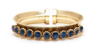 A Retro Yellow Gold and Sapphire Cuff Bracelet, Forstner, 24.00 dwts.