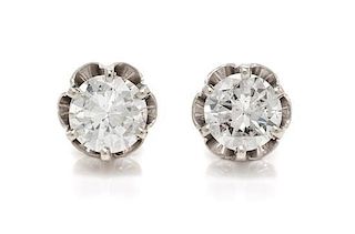 A Pair of White Gold and Diamond Stud Earrings, 1.70 dwts.