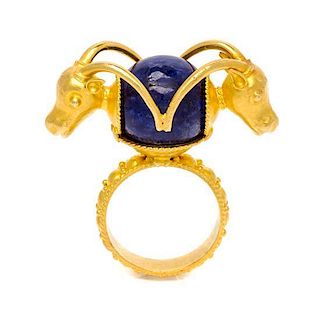 * A High Karat Yellow Gold and Lapis Lazuli Ring, 6.30 dwts.