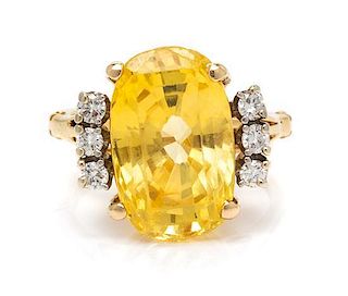 An 18 Karat Yellow Gold, Unheated Ceylon Yellow Sapphire and Diamond Ring, 5.50 dwts.