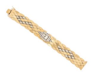 A Bicolor Gold and Diamond Wristwatch, 25.70 dwts.