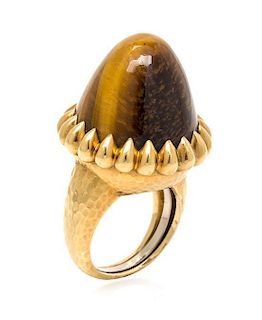 * An 18 Karat Yellow Gold and Tiger's Eye Bombe Ring, C. Vollrath, 22.30 dwts.