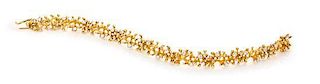 A Modernist Brutalist 18 Karat Yellow Gold and Diamond Bracelet, Ed Wiener, 20.10 dwts.