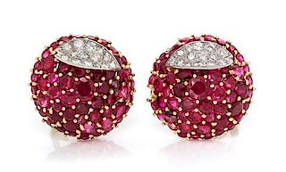 A Pair of 18 Karat Bicolor Gold, Ruby and Diamond Earclips, 11.70 dwts.