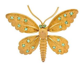 An 18 Karat Yellow Gold and Emerald Articulated Butterfly Brooch, Fred Paris, 9.40 dwts.