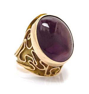 * A Yellow Gold and Amethyst Ring, Heikki Seppa, 12.00 dwts.