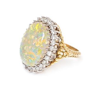 A Bicolor Gold, Opal and Diamond Ring, 7.10 dwts.