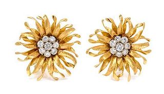 A Pair of Yellow Gold and Diamond Flower Motif Earclips, 9.70 dwts.