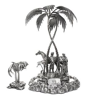 A Victorian Silver-Plate Figural Centerpiece, Elkington & Co., Birmingham, circa 1870, the rockwork base mounted with twisted pa