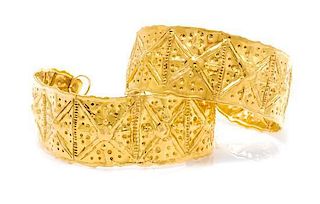A Pair of High Karat Gold Cuff Bracelets, 33.00 dwts.