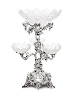 A Victorian Silver and Cut-Glass Four Basket Epergne, John Kilpatrick, London, 1872, the domed base raised on four openwork brac