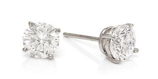 A Pair of Platinum and Diamond Studs, Tiffany & Co., 1.80 dwts.