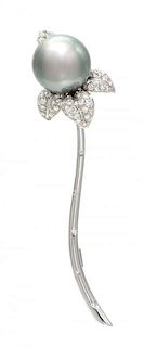 An 18 Karat White Gold, Cultured Tahitian Pearl and Diamond Flower Brooch, Sidney Garber, 8.50 dwts.