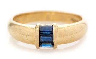 An 18 Karat Yellow Gold and Sapphire Band, Tiffany & Co., 2.80 dwts.
