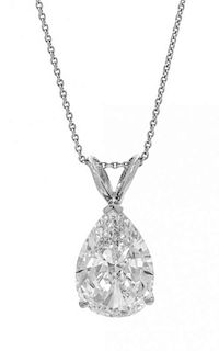A White Gold and Treated Diamond Pendant, 2.70 dwts.