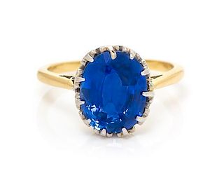 A Platinum, Gold and Sapphire Solitaire Ring, 3.10 dwts.