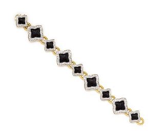 An 18 Karat Bicolor Gold, Onyx and Diamond Quatrefoil Bracelet, David Yurman, 41.80 dwts.