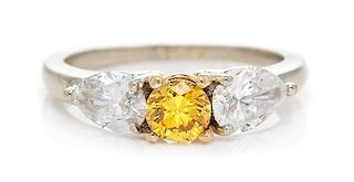 A Bicolor Gold, Fancy Vivid Yellow Diamond and Diamond Ring, 2.30 dwts.