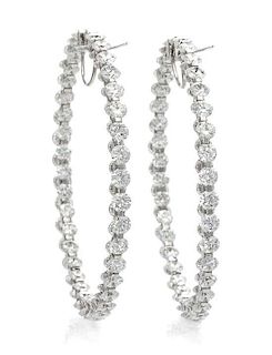 A Pair of 18 Karat White Gold and Diamond Inside-Out Hoop Earrings, Chopard, 8.70 dwts.