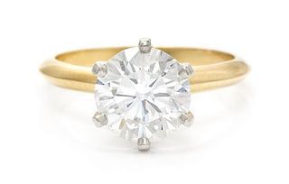 An 18 Karat Yellow Gold, Platinum and Diamond Solitaire Ring, Tiffany & Co., 2.60 dwts.