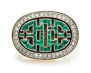 * A Platinum Topped Gold, Emerald and Diamond Pin, 4.70 dwts.
