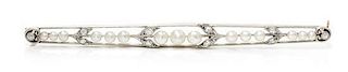 * An Edwardian Platinum Topped Gold, Pearl and Diamond Bar Brooch, Blank, Henry & Co., 6.60 dwts.