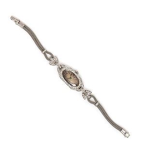 * An Art Deco Platinum and Diamond Wristwatch, Blancpain LeCoultre for Lebolt & Co., 15.90 dwts.
