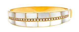 An 18 Karat Yellow Gold, Mother-of-Pearl and Diamond Bangle Bracelet, 21.50 dwts.