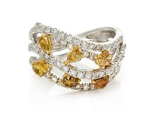 An 18 Karat White Gold, Colored Diamond and Diamond Ring, 5.40 dwts.