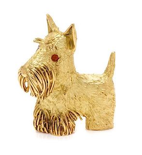 A Yellow Gold and Carnelian Scottish Terrier Brooch, 16.00 dwts.