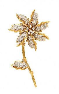 An 18 Karat Bicolor Gold and Diamond Flower Brooch, 12.00 dwts.