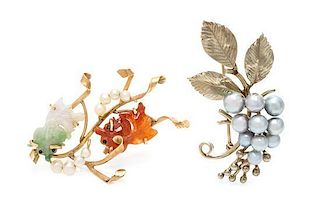 * A Collection of Gold and Gem Brooches, Ming's, 12.70 dwts.