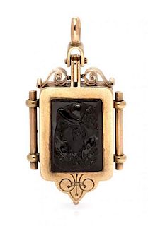 A Victorian Yellow Gold and Onyx Cameo Fob Pendant, 5.90 dwts.